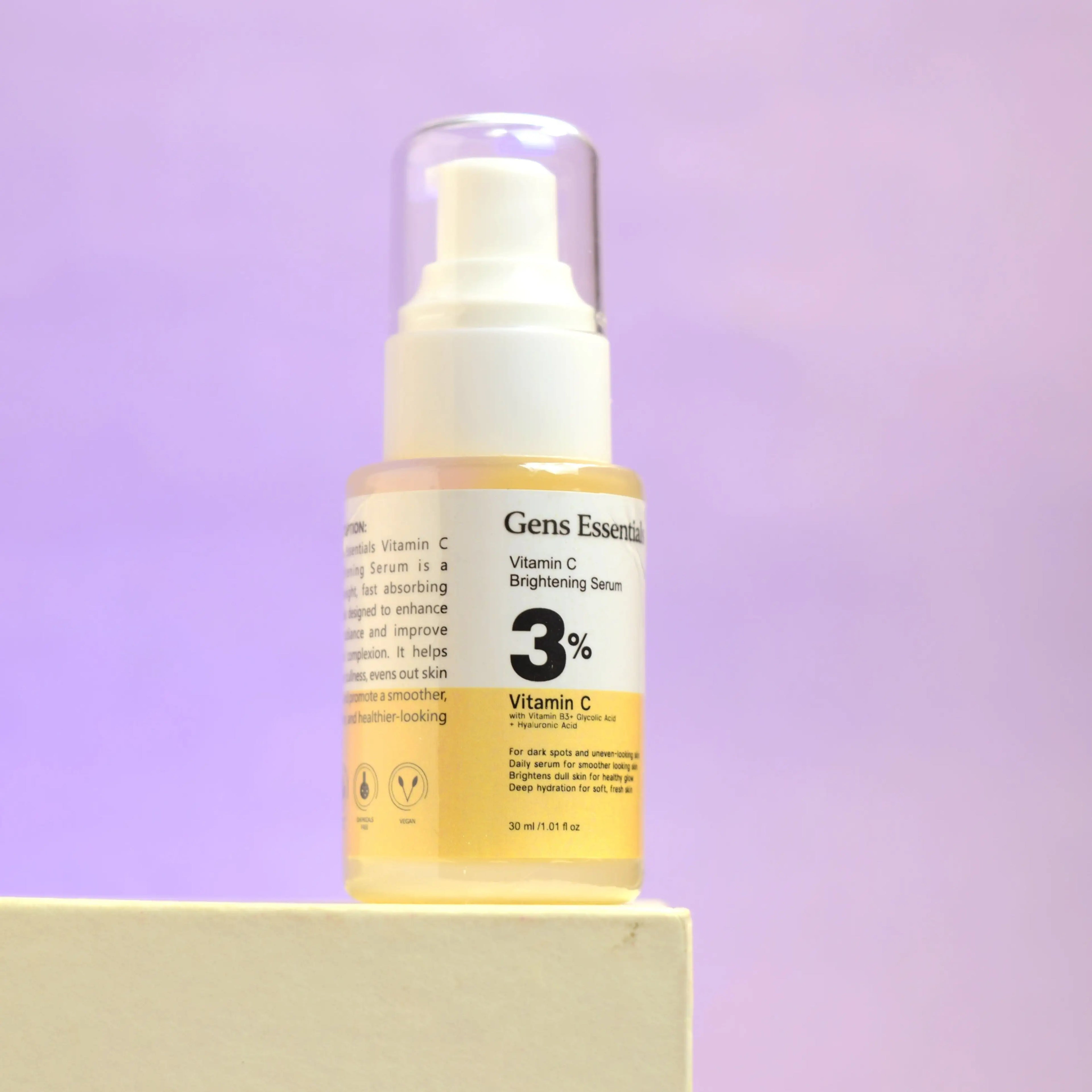 Skincare serum bottle with text on a purple background  Vitamin C Brightening Serum Gens Essentials  Gens Essentials