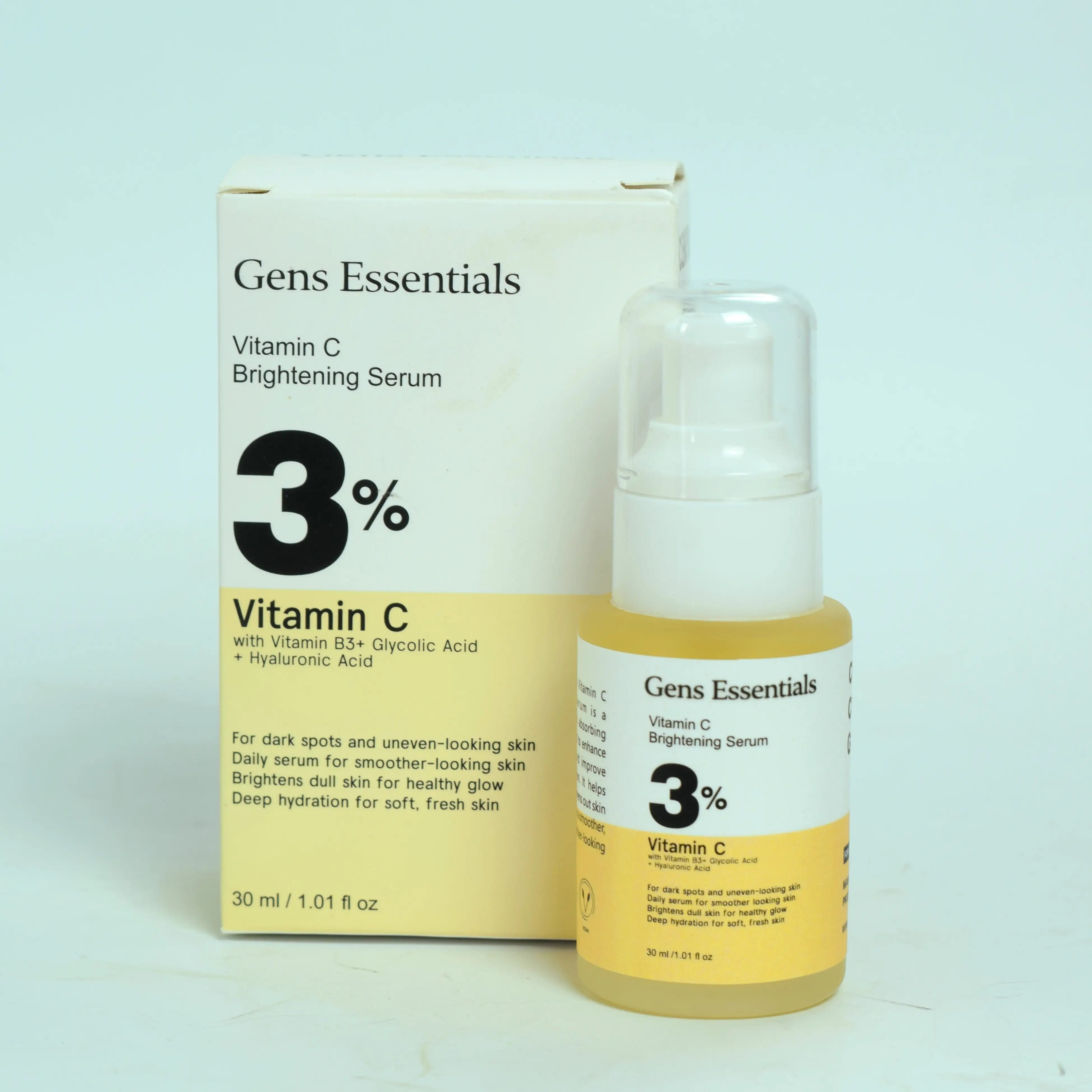Gens Essentials Vitamin C 3% serum bottle and packaging on a light blue background  Vitamin C Brightening Serum Gens Essentials  Gens Essentials